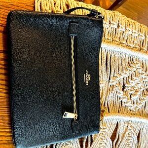 Black coach small bag with wrist band
